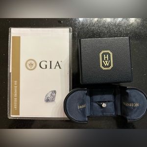 Harry Winston platinum diamond engagement ring.